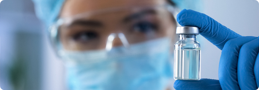  Scientist holds vial with new medication 